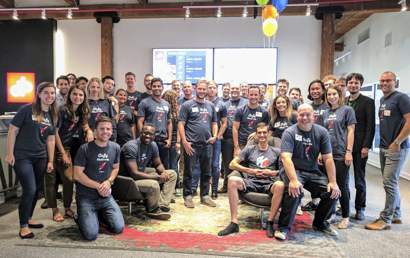 The Devbridge team at our Defy Mediocrity open house
